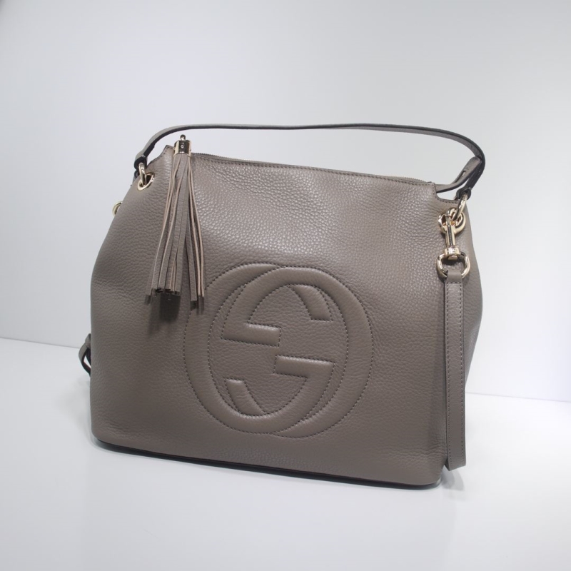 G*u*i top handle bags